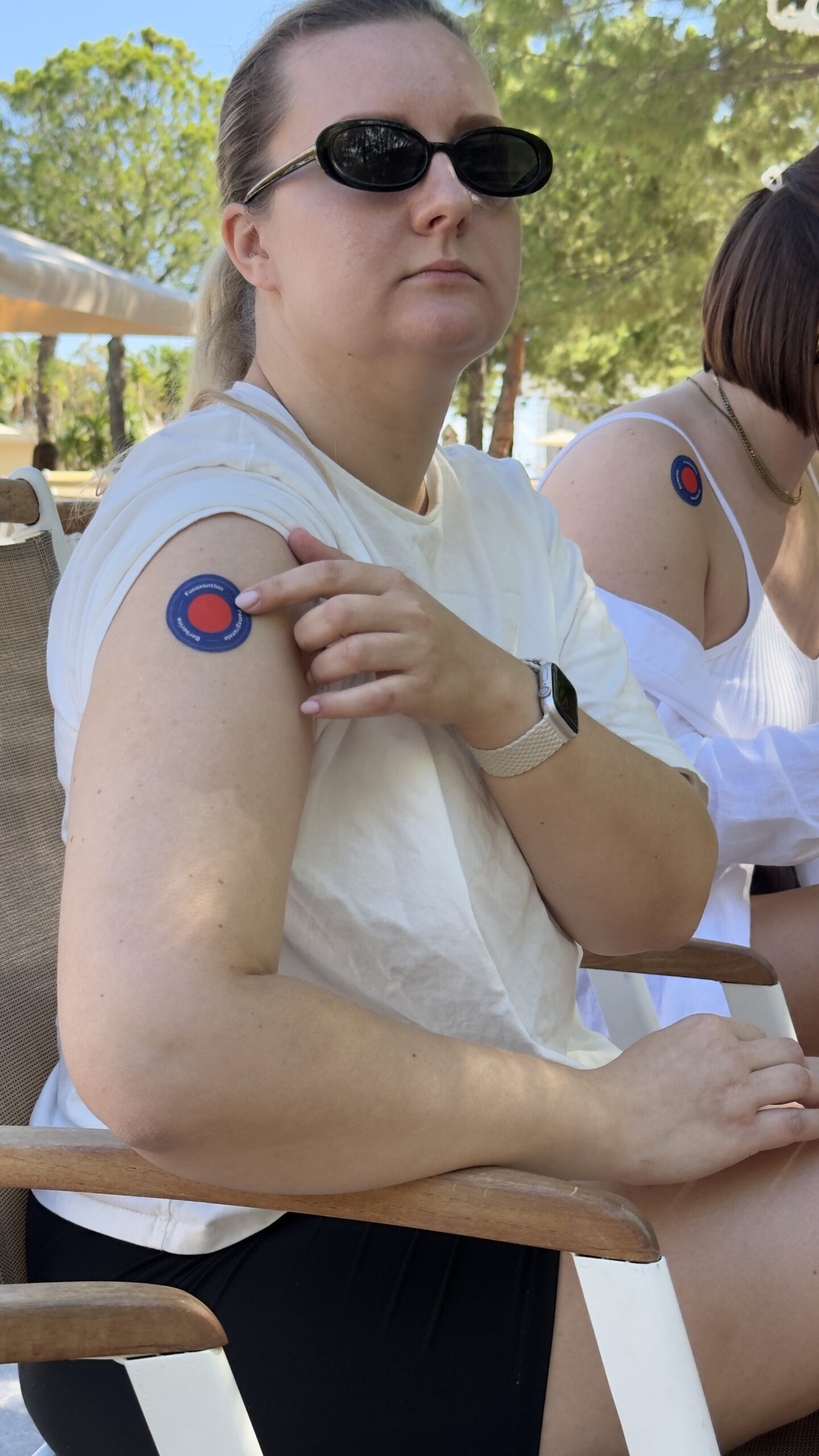 Woman wearing Purisaki patch during daily activities